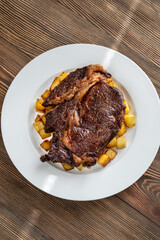 Beefsteak with fried potato