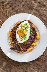 Beefsteak with fried egg