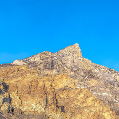 Square Steep peak and rocky slopes of a mountain in Provo Canyon Utah on a sunny day