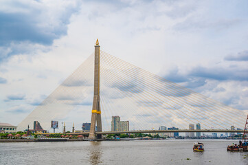 Fototapeta na wymiar Bangkok/Thailand-30/5/2020:Rama VIII Bridge with beautiful sky.The Rama VIII Bridge or called is a suspending bridge crossing the Chao Phraya River in Bangkok, Thailand