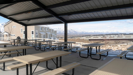 Panorama Pavilion at a park in South Jordan City Utah overlooking snowy Wasatch Mountains