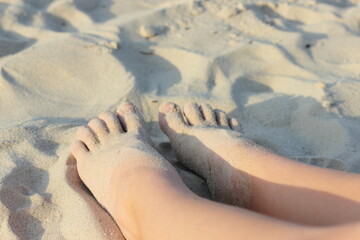 feet on the beach
