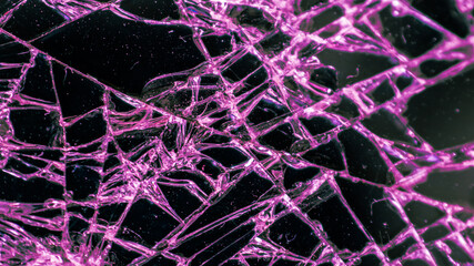 Multi-colored and bright broken smartphone screen close-up.
