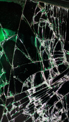 Multi-colored and bright broken smartphone screen close-up.