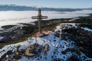 Aerial view of the Millennium Cross on the top of Vodno Mountain on sunrise