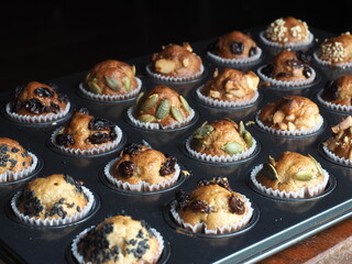 Mini banana cake with cranberry, macadamia, pumpkin seed and sesame seed topping