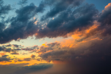 Naklejka na ściany i meble Beautiful dramatic sky. Sunset or sunrise time. Amazing purple clouds.