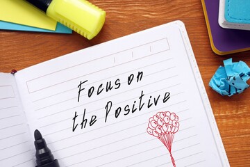 Motivation concept about Focus on the Positive with inscription on the page.