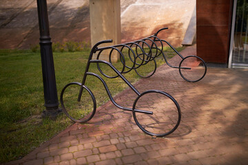 Bicycle iron parking in the form of bicycles.
