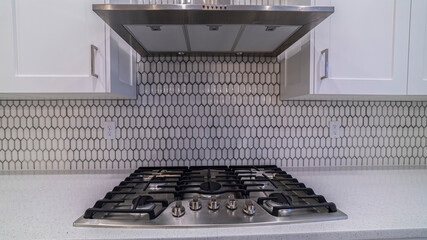 Panorama frame Modern gas cooker hob under an extractor fan
