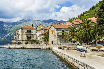 Fototapeta premium Beautiful landscape of Perast - historic town on the shore of the Boka Kotor bay (Boka Kotorska), Montenegro, Europe. Kotor Bay is a UNESCO World Heritage Site.