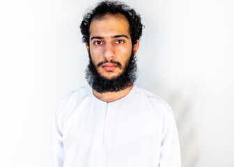 Arabic man standing his long beard and fuzzy hair