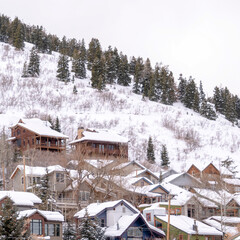 Square Residential cabins on snowy mountain neighborhood in Park City Utah in winter