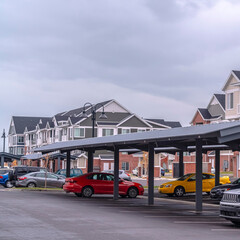 Square Undercover parking for cars at apartment complex