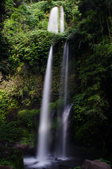 rinjani waterfall in the forest at lombok island