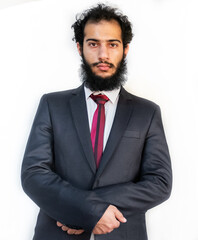 Muslim man wearing tuxedo and crossing his hands