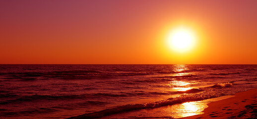 Beautiful cloudscape over the sea, sunrise shot. Wide photo