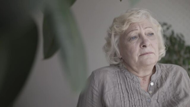 Upset old woman suffering loneliness, missing family, abandoned at senior age