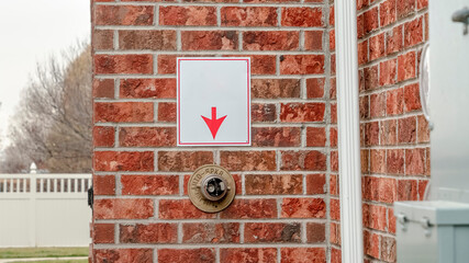 Panorama frame Brick wall with arrow pointing to fire sprinkler
