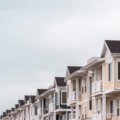 Square Row of modern upmarket duplex apartments day light