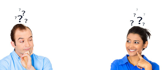 Man and woman with question mark looking at each other with interest isolated on white background 