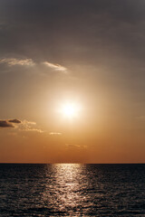 Beautiful warm sunset on the sea. Beautiful scenery. Charming sunset