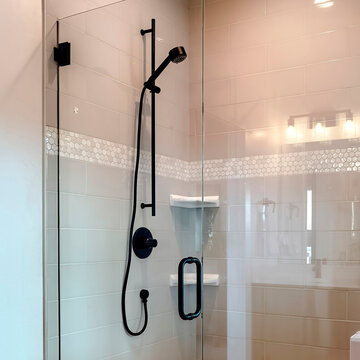 Square frame Shower stall with half glass enclosure and black shower head and handle