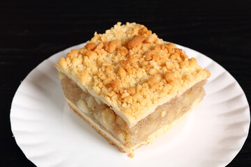 Apple Pie on disposable paper plate. Double crust apple pie with cinnamon made with shortcrust...