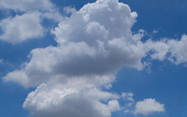 Naklejka na ściany i meble Blue sky and white clouds, white clouds, blue on the background.