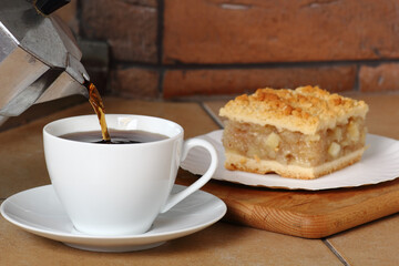 Pouring Coffee into Cup and Apple Pie. Breakfast.