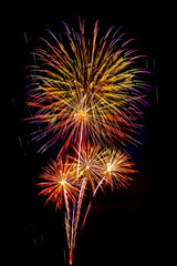 Fototapeta premium celebration happy new year and merry christmas firework isolated on black isolated background
