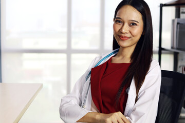 Portrait beautiful young Asian doctor woman with stethoscope for use in clinic or hospital room.