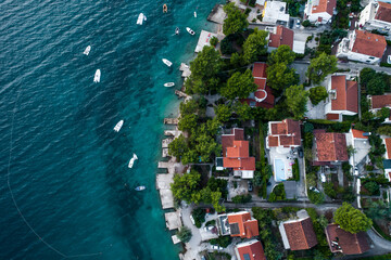 Aerial top down view of a residential neighborhood by the sea