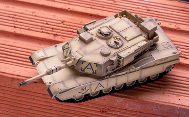 Tanque de guerra de brinquedo em fotografia close up. Estilo parecido com o M1 Abrams