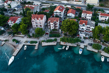 Aerial view of a neighborhood with houses by the sea in Croatia