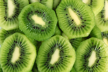 Background of kiwi slices (kiwifruit).