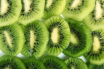Background of kiwi slices (kiwifruit).