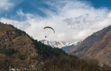 Paragliding in Mountains.