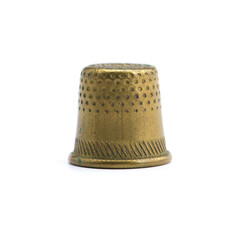 Old copper thimble close-up isolated on white background
