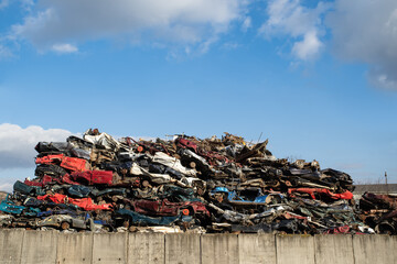 Old damaged wrecked cars on the junkyard waiting for recycling - obrazy, fototapety, plakaty