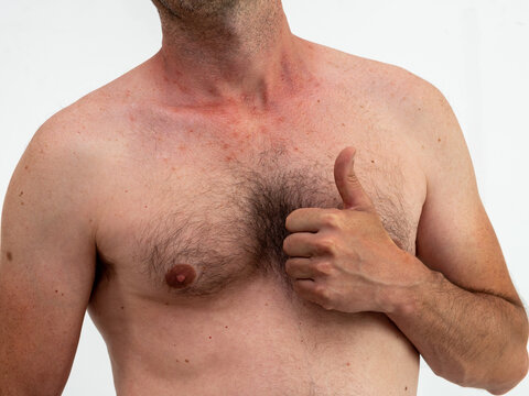 Caucasian man body without shirt with hair on chest and thumb up