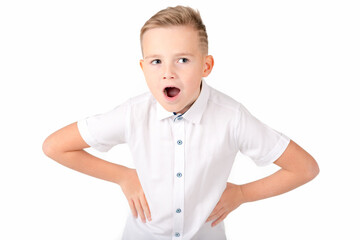 Portrait of joyful 9 year old boy . Handsome caucasian teenager laughing and keeping mouth wide open looking surprised. isolated on white background.Boy looking at camera.