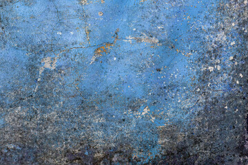 Old cementy moldy blue wall with fungus