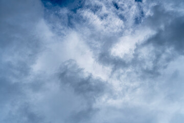 Cumulus clouds on a bright blue sky