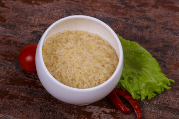 Raw uncooked rice in the bowl