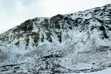 Photo of a stunning and beautiful landscape with snow in Iceland during winter