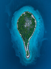 Large panoramic top down photo of a small island in shape of a drop