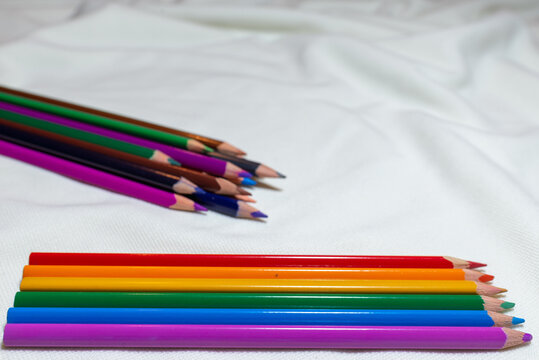 lgbt and human rights minimal concept, a pencils like a LGBT flag, isolated on white background