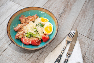 Caesar Salad with Bacon and Chicken Fillet
