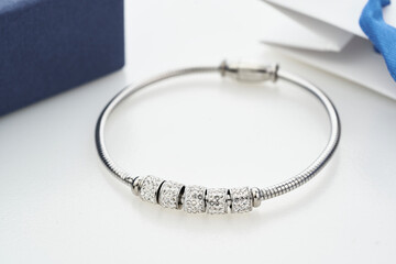 Beautiful silver bracelet with crystals isolated on white